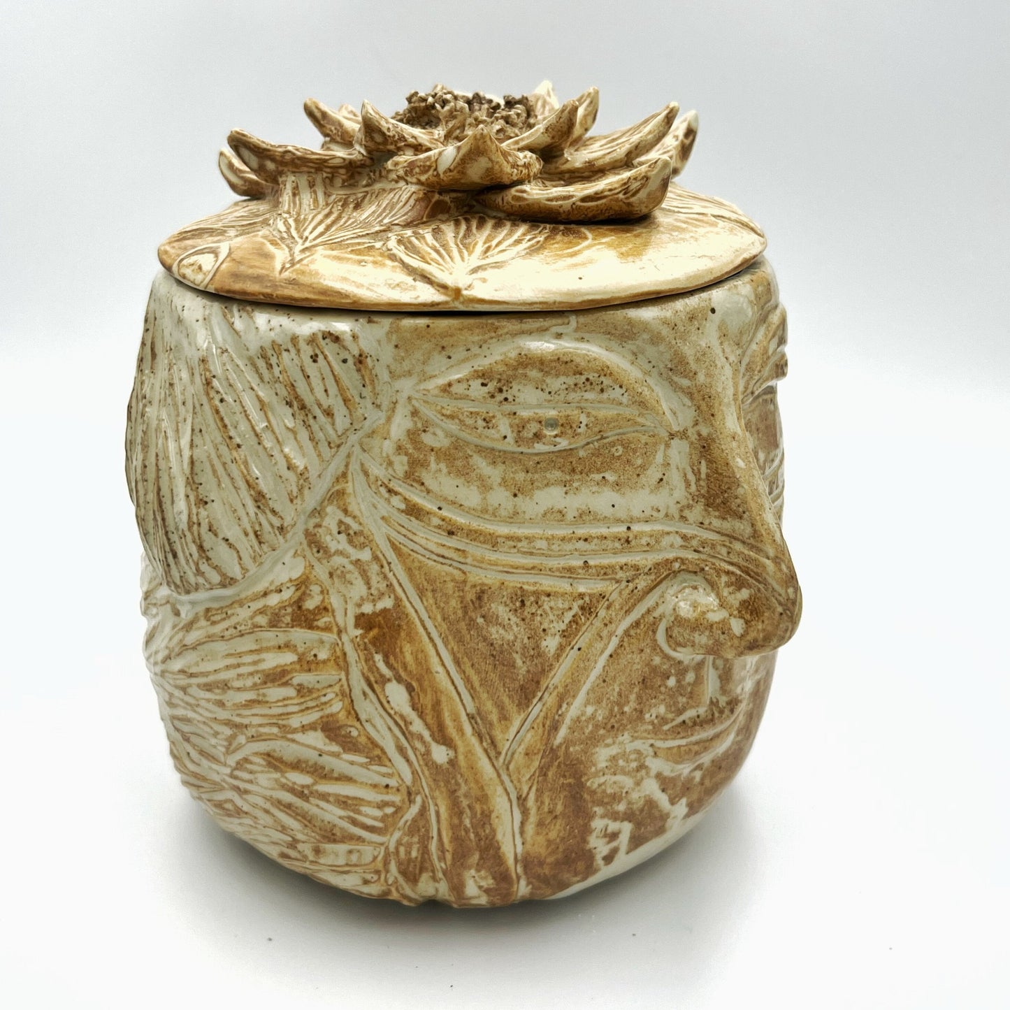 Shaman face ceramic jar